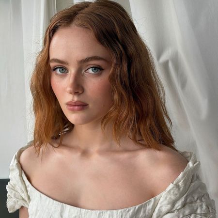 Sadie Sink wearing brown eyeshadow that makes her blue eyes pop