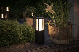 Set the mood and light up your garden in winter with weatherproof outdoor lighting