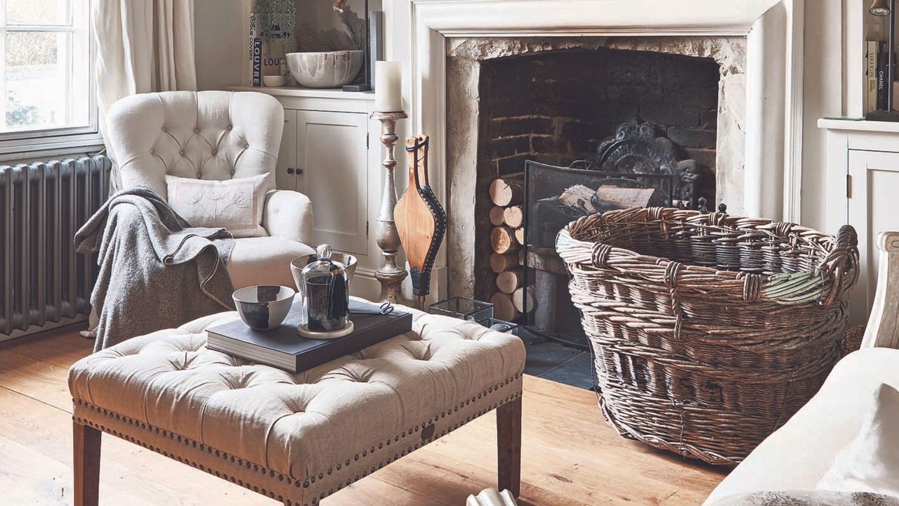 scandi living room with white armchair and wooden flooring