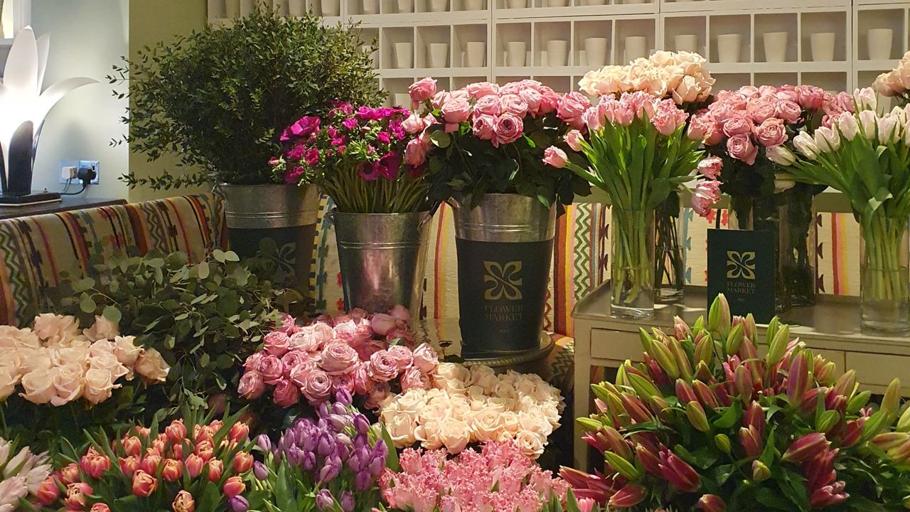 M&amp;S Flower Market-branded buckets of fresh flowers, including the exclusive pink peony roses