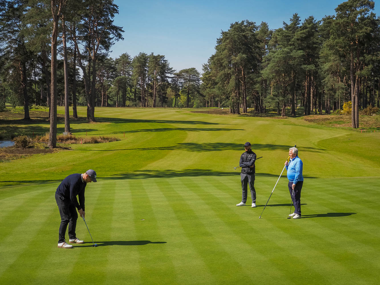 Tending the flag on the 9th at Liphook