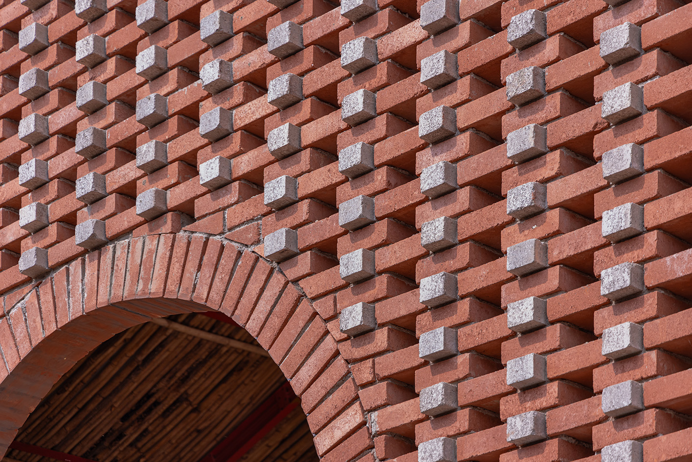 Gaugram , a cow shelter with pitched roofs and brick structure