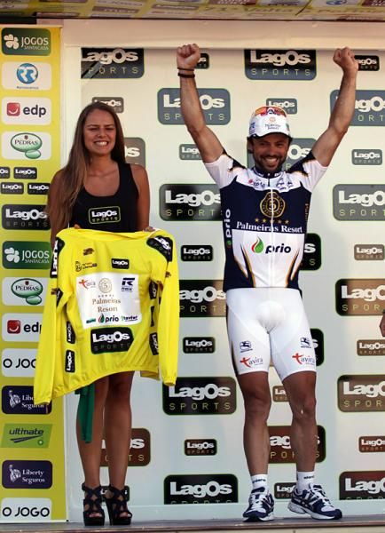 Portugal's Candido Barbosa (Palmeiras Resort / Tavira) steps to the podium to receive the Volta a Portugal's first yellow jersey.
