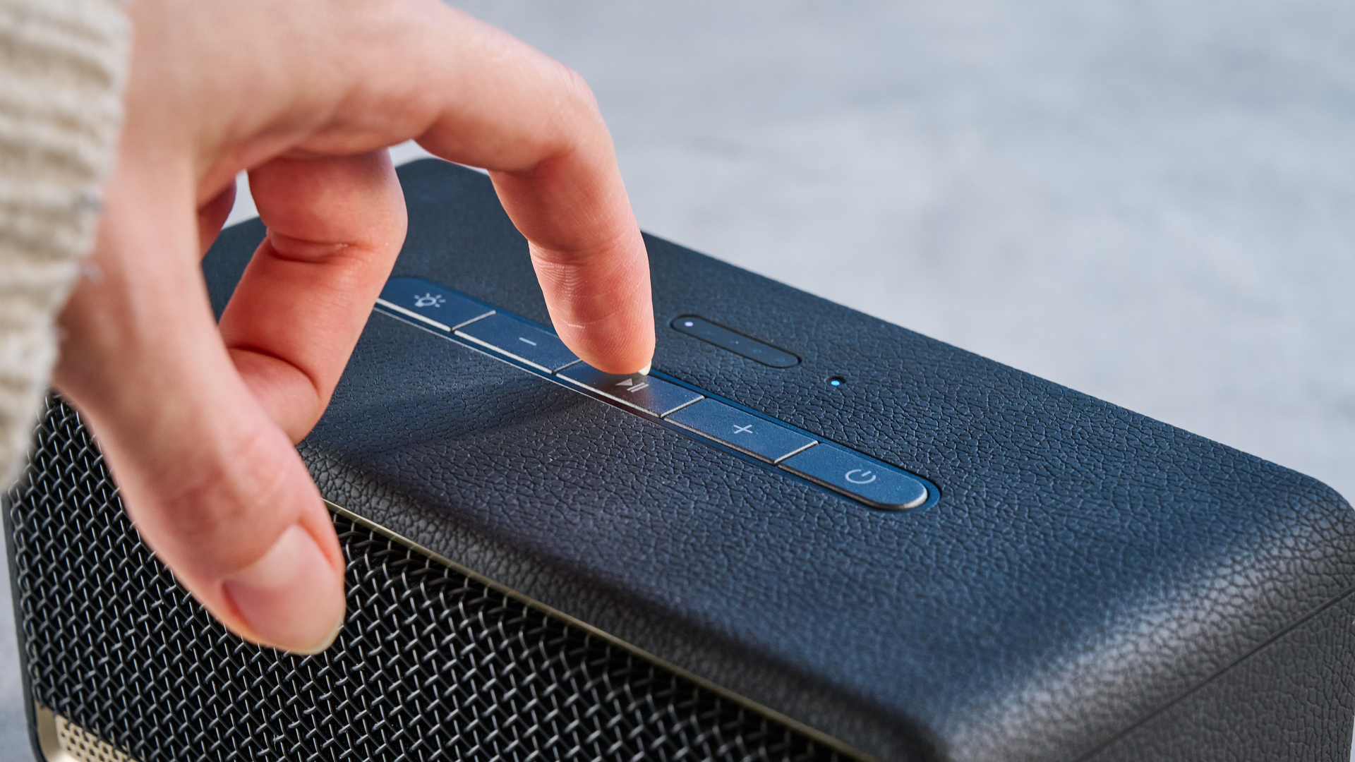 A black Edifier ES60 Bluetooth speaker