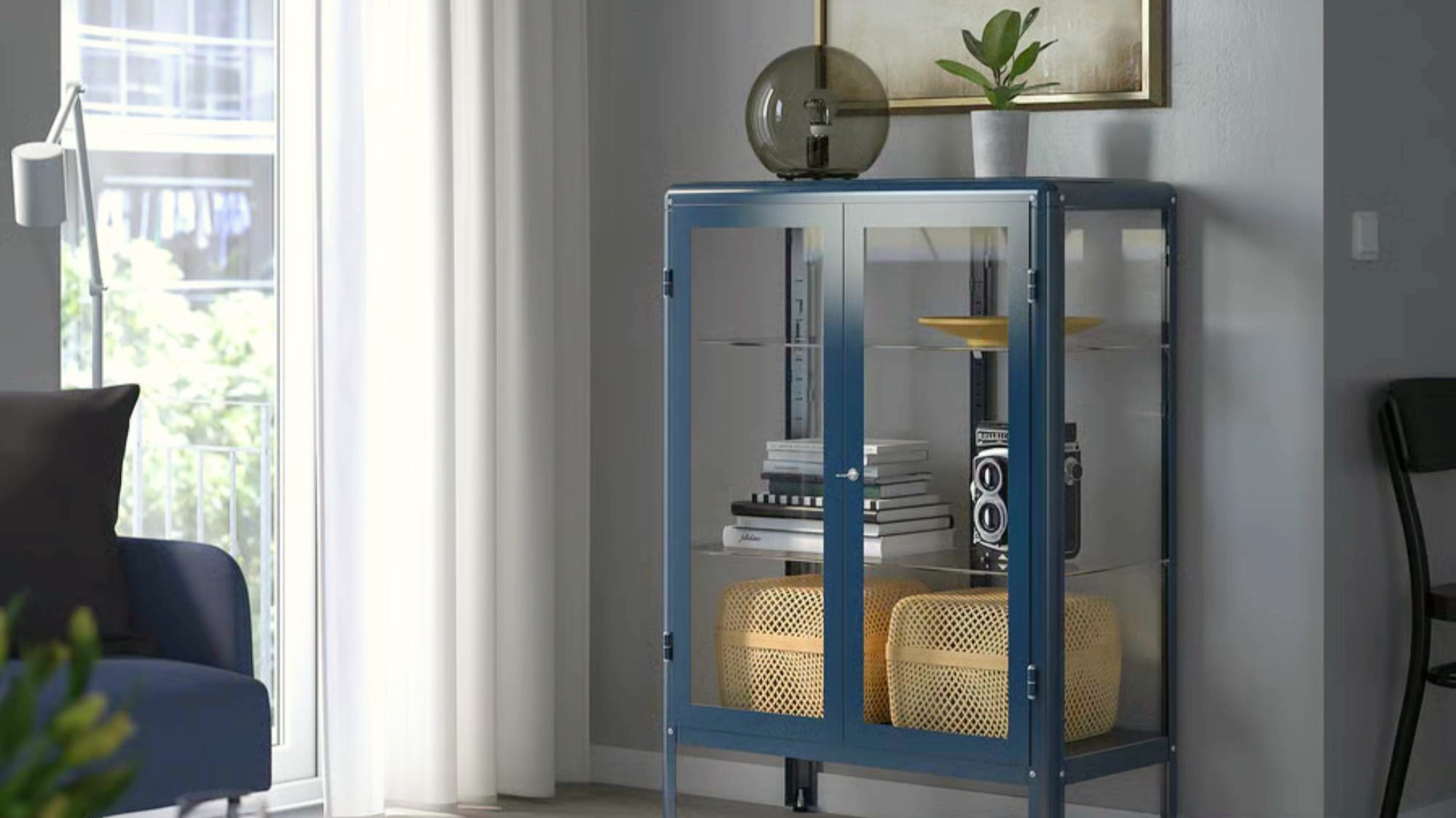 Dark blue metal and glass cabinet