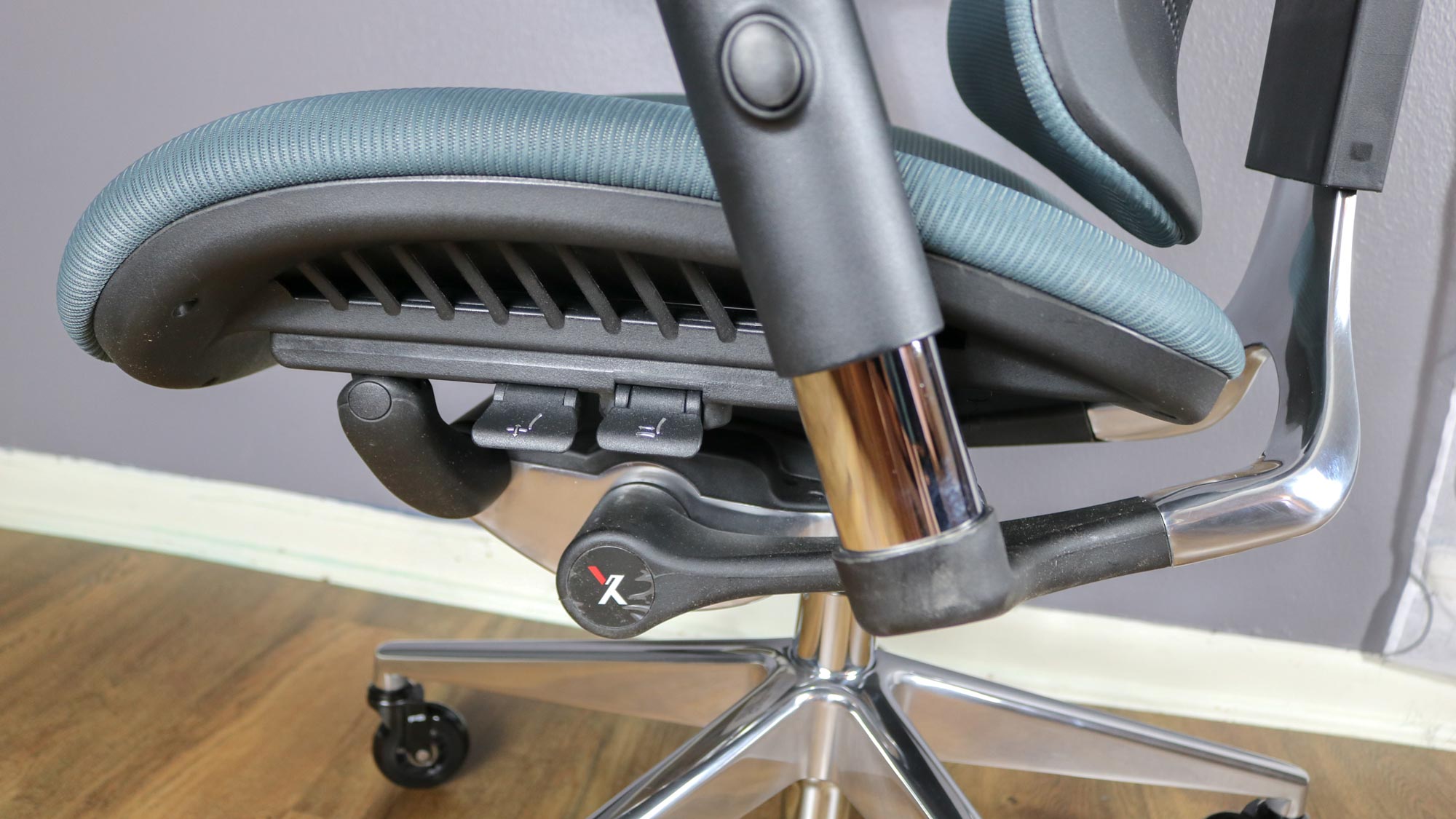 A closeup shot of the seat and adjustment knobs on the left side of the X-Chair X3