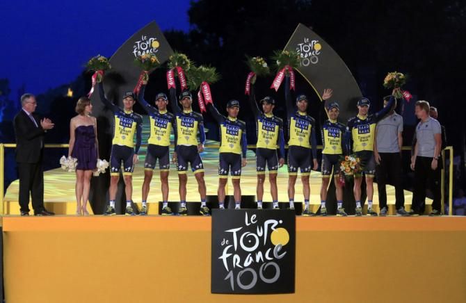 Saxo - Tinkoff stand victorious as winners of the team classification at the 2013 Tour de France