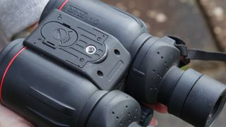 Image is a closeup of the Canon 10x42L IS WP binoculars.