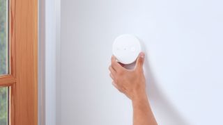 The Ring breaking glass sensor - an add on for the brand's smart alarm system - installed on a wall
