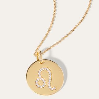 jewellery gifts gold disc pendant with the leo sign in white crystals