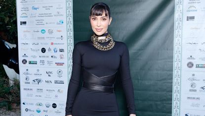 Kim Kardashian debuts baby bangs at a charity event