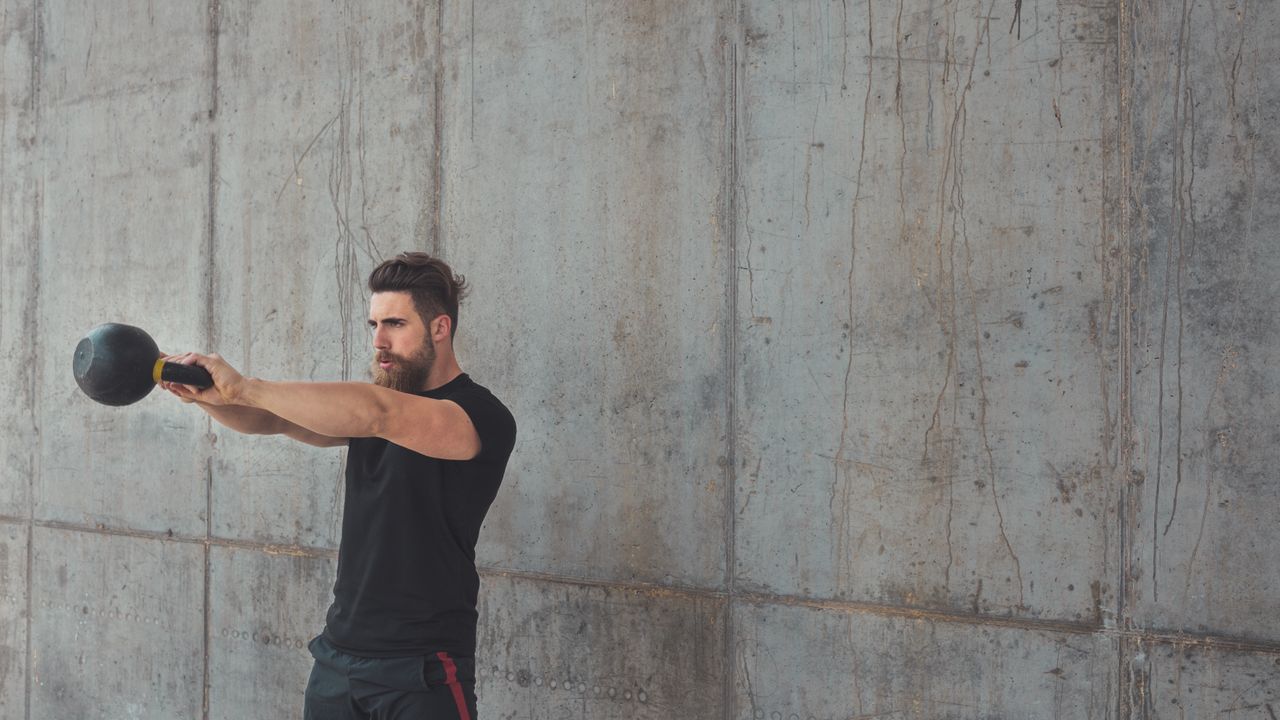 I did 100 kettlebell swings a day for a week — here's what happened