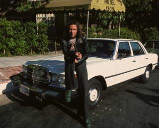 Ritchie Blackmore posing in the street in Los Angeles