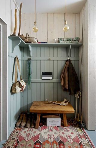 boot room with coat hooks tongue and groove panelling shiplap walls