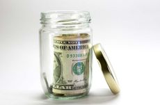 A jar with money inside.