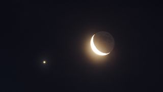 On Wednesday morning, January 30, 2019, the bright planet Jupiter was captured traveling under the lower left of the illuminated Waning Crescent Moon posing for astronomers, astrologists, and photographers to create a stunning planetary scene. (Image credit: Vlad Georgescu / Getty Images)