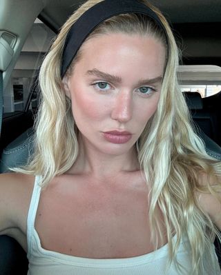 Megan Adelaide with flushed cheeks and healthy-looking skin