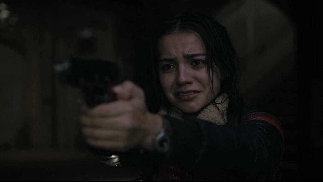 Dina (Isabela Merced) pulls a gun on Ellie after she's bitten on The Last of Us Season 2 Episode 4.