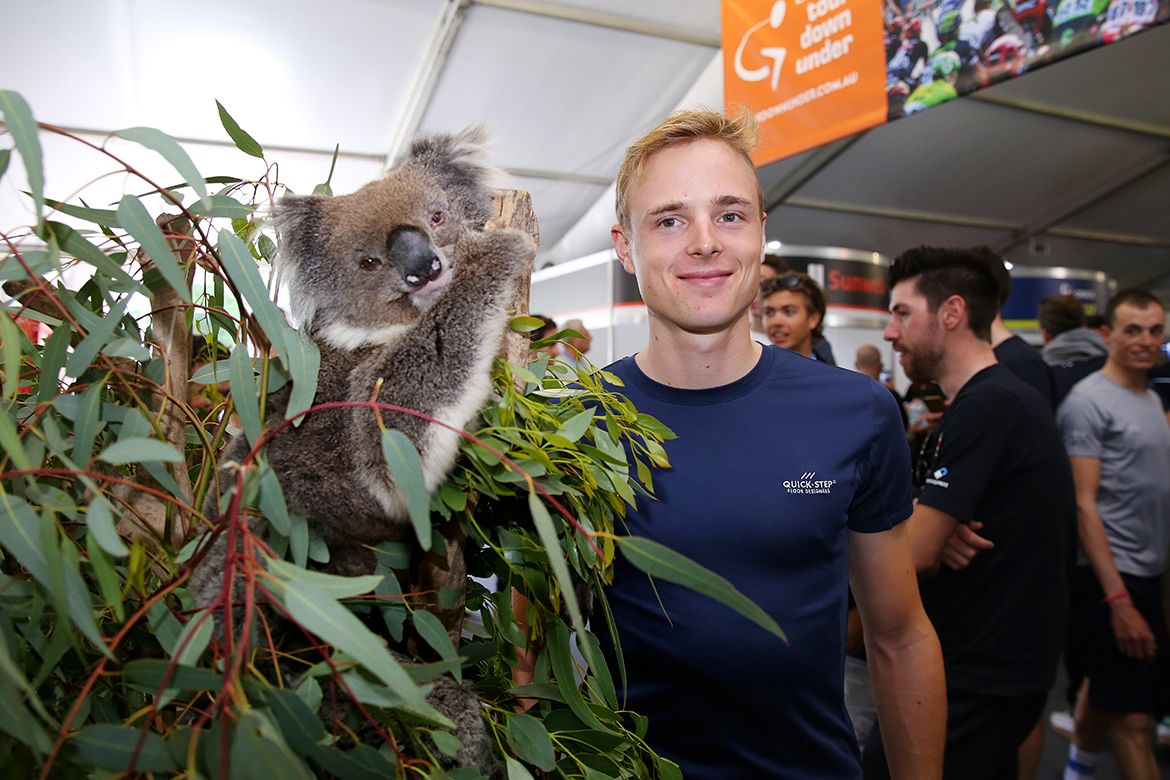 Petr Vakoc stands next to a koala