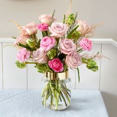 flower pot with white walls and roses