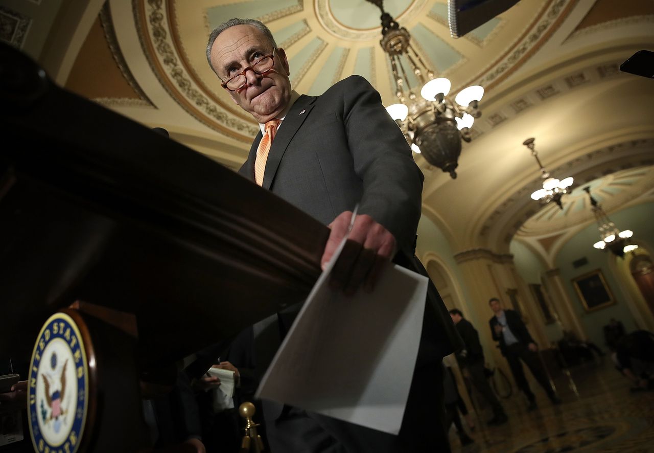 Chuck Schumer speaks at a press conference 