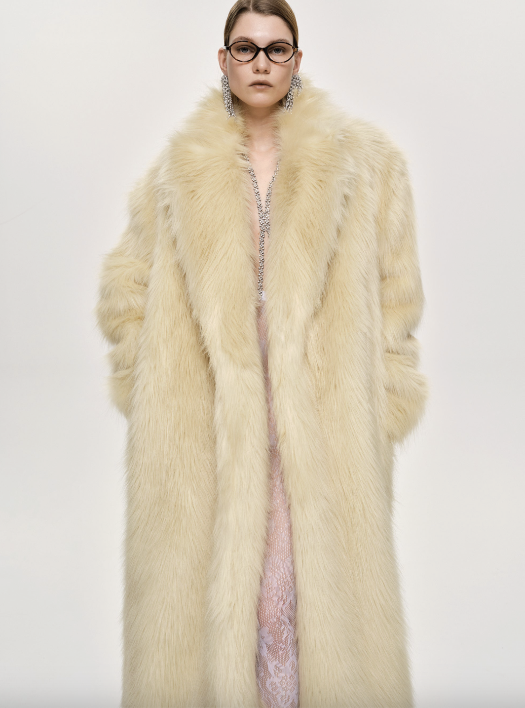 woman in fur source unknown coat