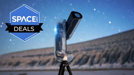 The Vaonis Vespera II X edition against a starry landscape, with a blue Space.com deals badge in the upper left hand corner. 