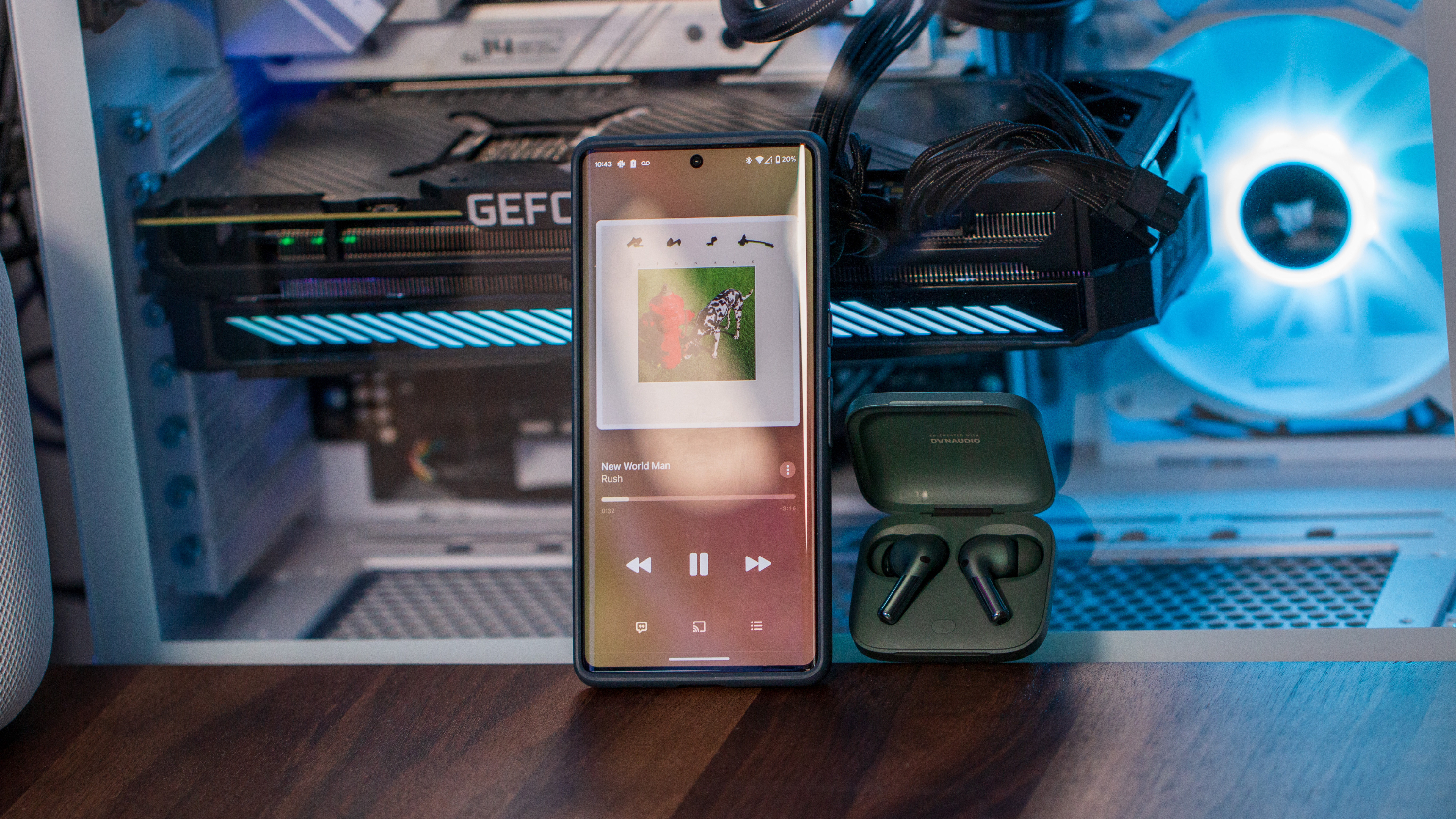 OnePlus Buds Pro 2 next to Pixel 7 Pro playing Apple Music