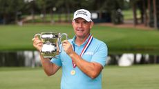 Padraig Harrington holds up the US Senior Open trophy after winning at Broadmoor Golf Club in 2025