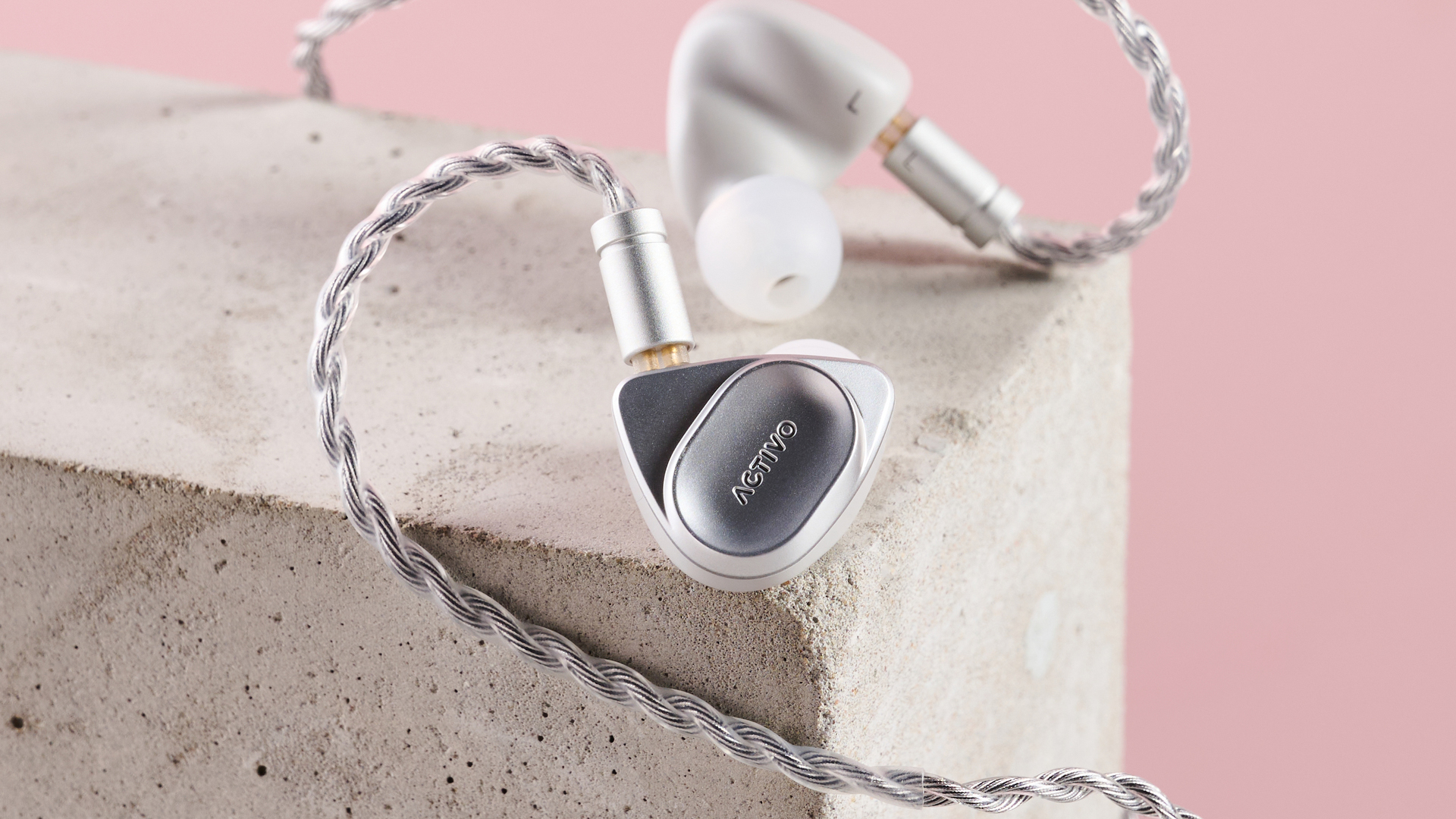 Activo Volcano right earbud balanced on block