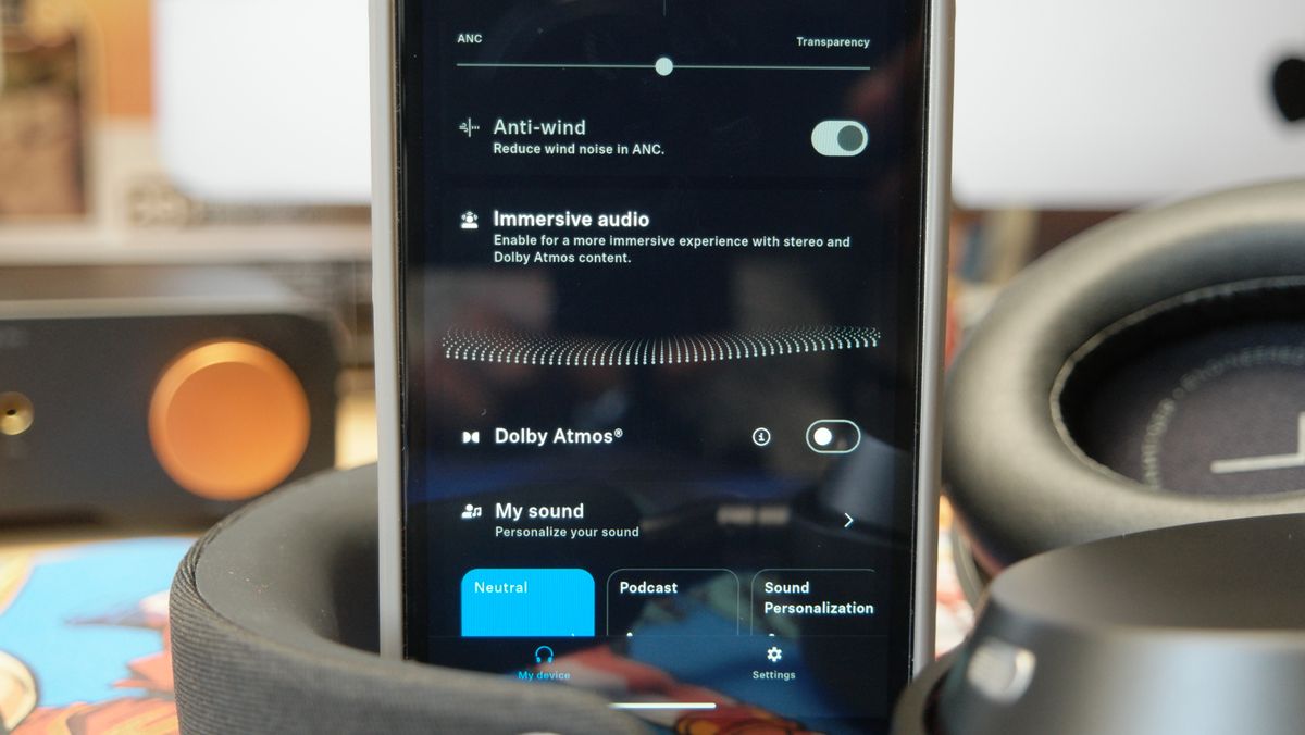 Sennheiser Momentum 5 headphones on a desk with a FiiO M21 DAP