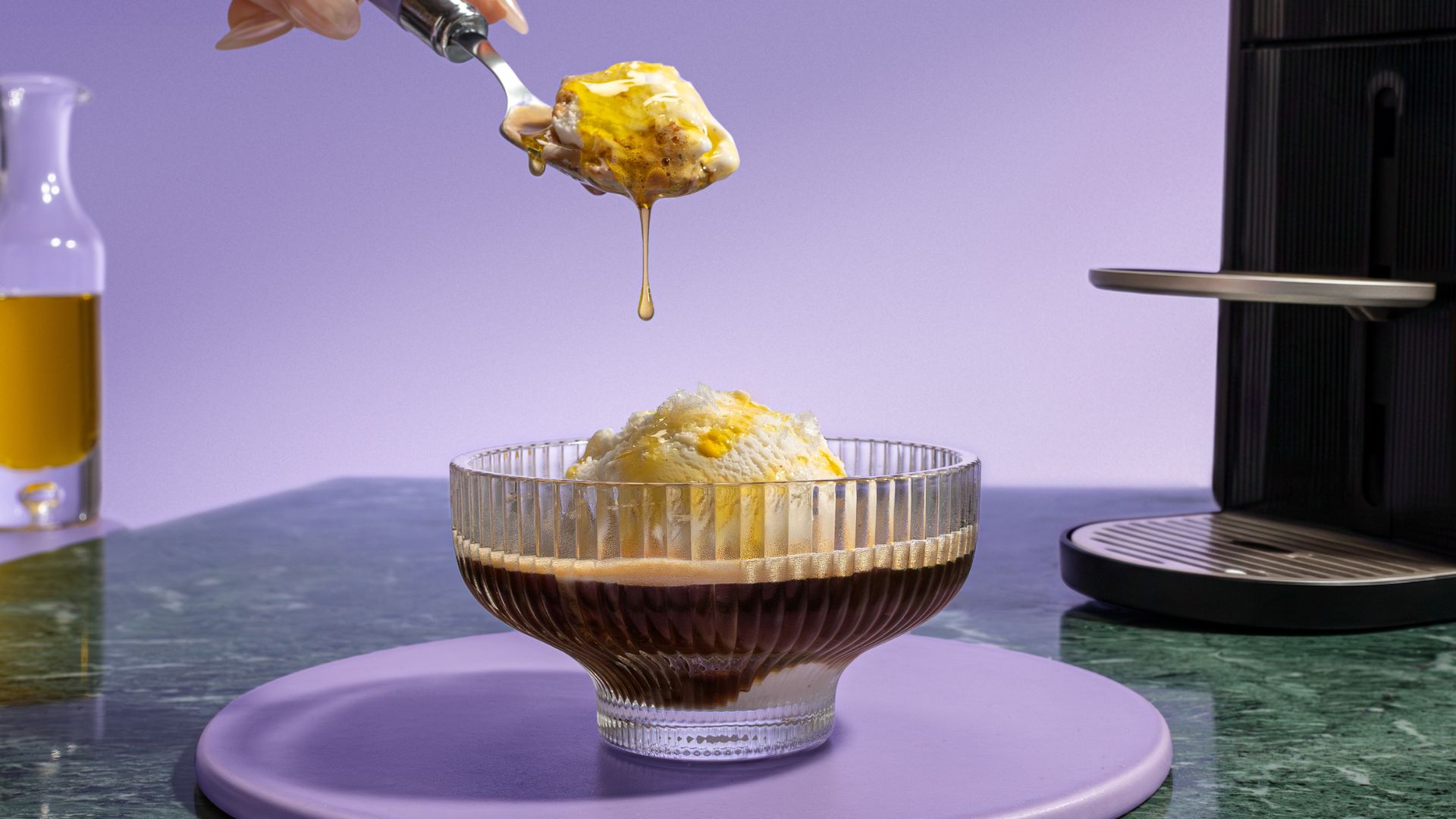 One of the new Nespresso Vertuo Pod flavours, the Salted Affogoilto with Nespresso Vertuo Up and olive oil in the background