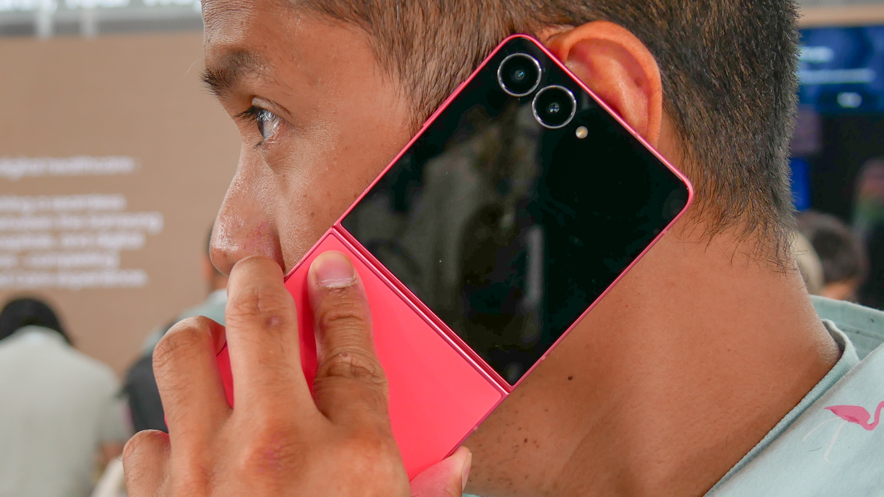 Using the Samsung Galaxy Z Flip 7 for a phone call.