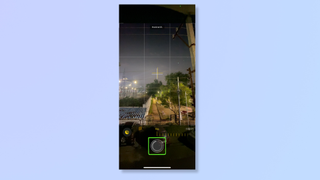 A screenshot of the iPhone's Camera app with the shutter button highlighted.