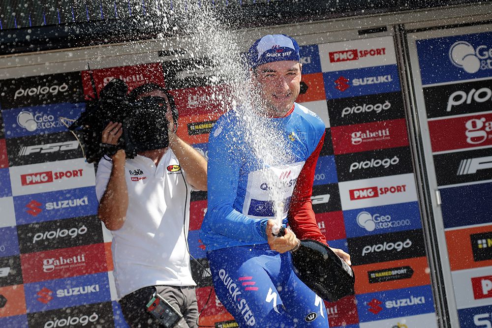 Elia Viviani celebrates on the podium after opening team time trial at Adriatica Ionica Race