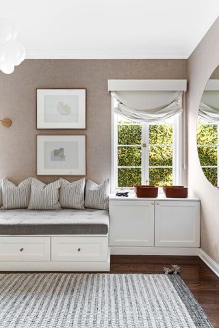 A window with a built-in daybed