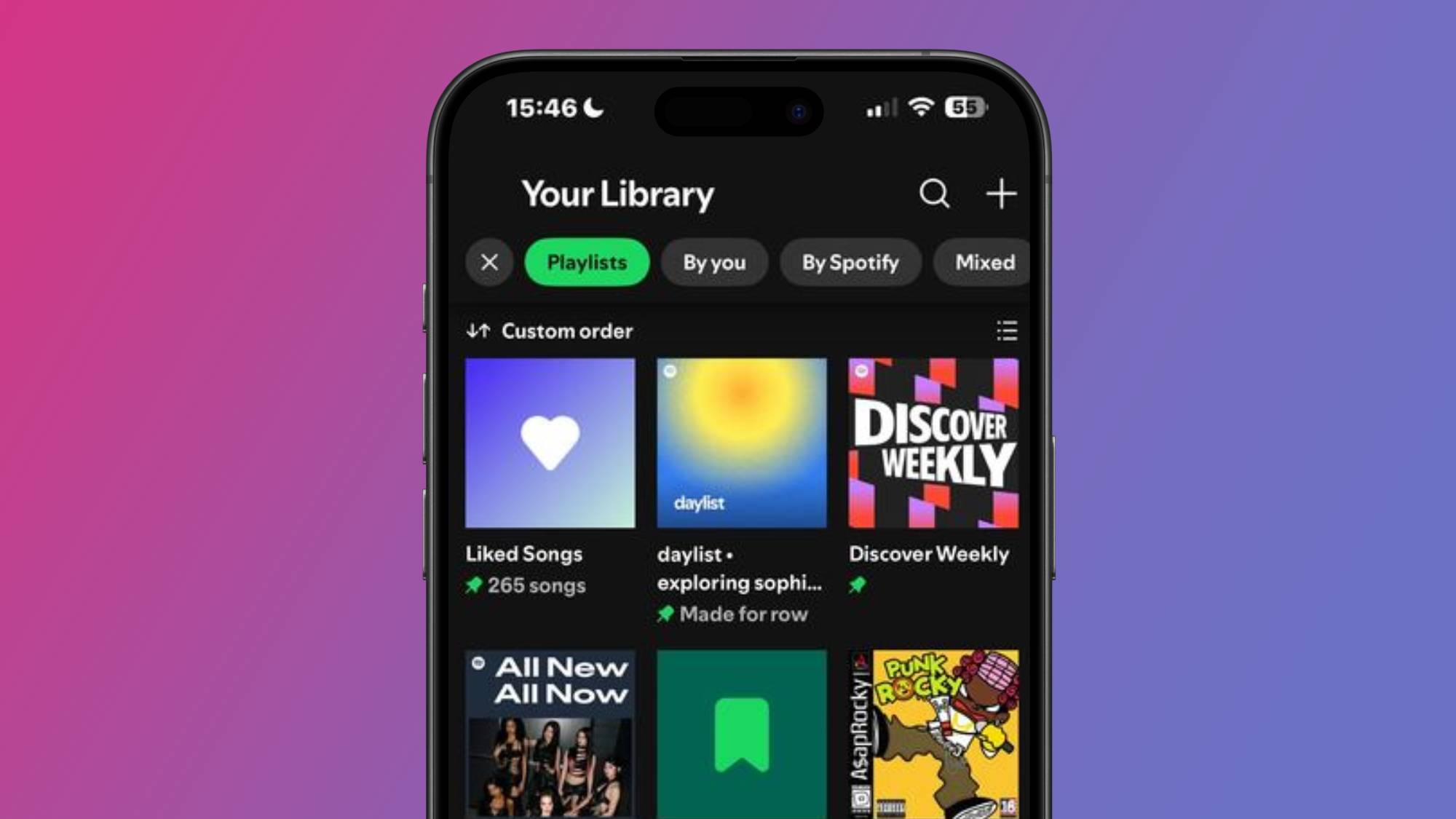 A smartphone showing a Spotify Library page with pinned playlists