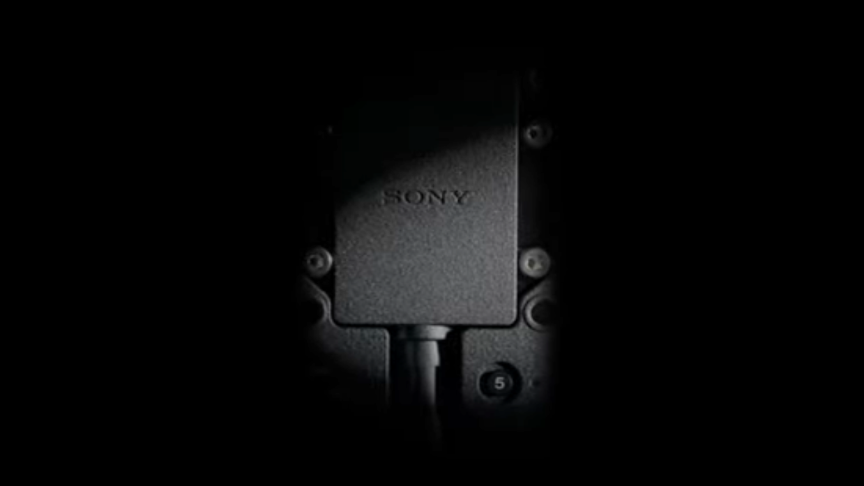 A teaser of an upcoming Sony camera, low key lighting, dark background