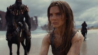 Nova (Freya Allan) sits on a beach in &quot;Kingdom of the Planet of the Apes&quot;