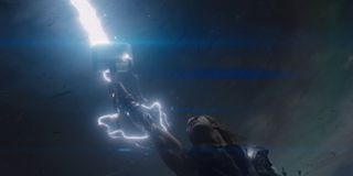 Chris Hemsworth as Thor summoning lightning