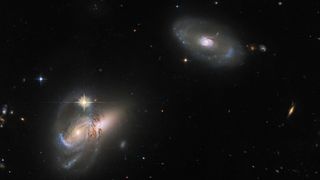 Multiple galaxies can be seen in a deep-field image of space.