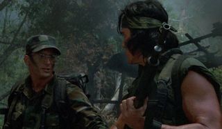 Hawkins telling Billy a joke in Predator