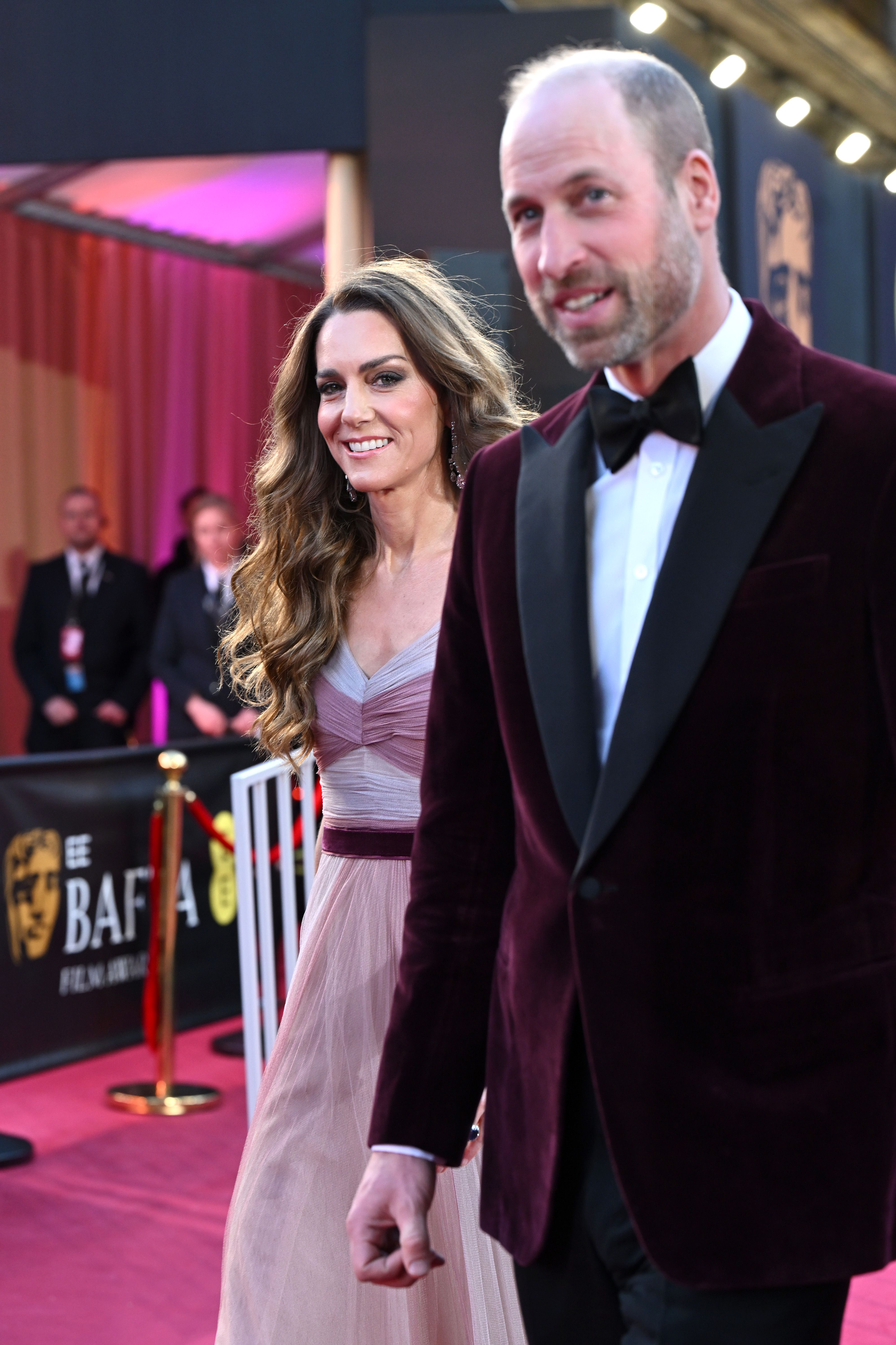 Princess Kate in a pink gown and Prince William in a burgundy blazer on the BAFTAS 2026 red carpet