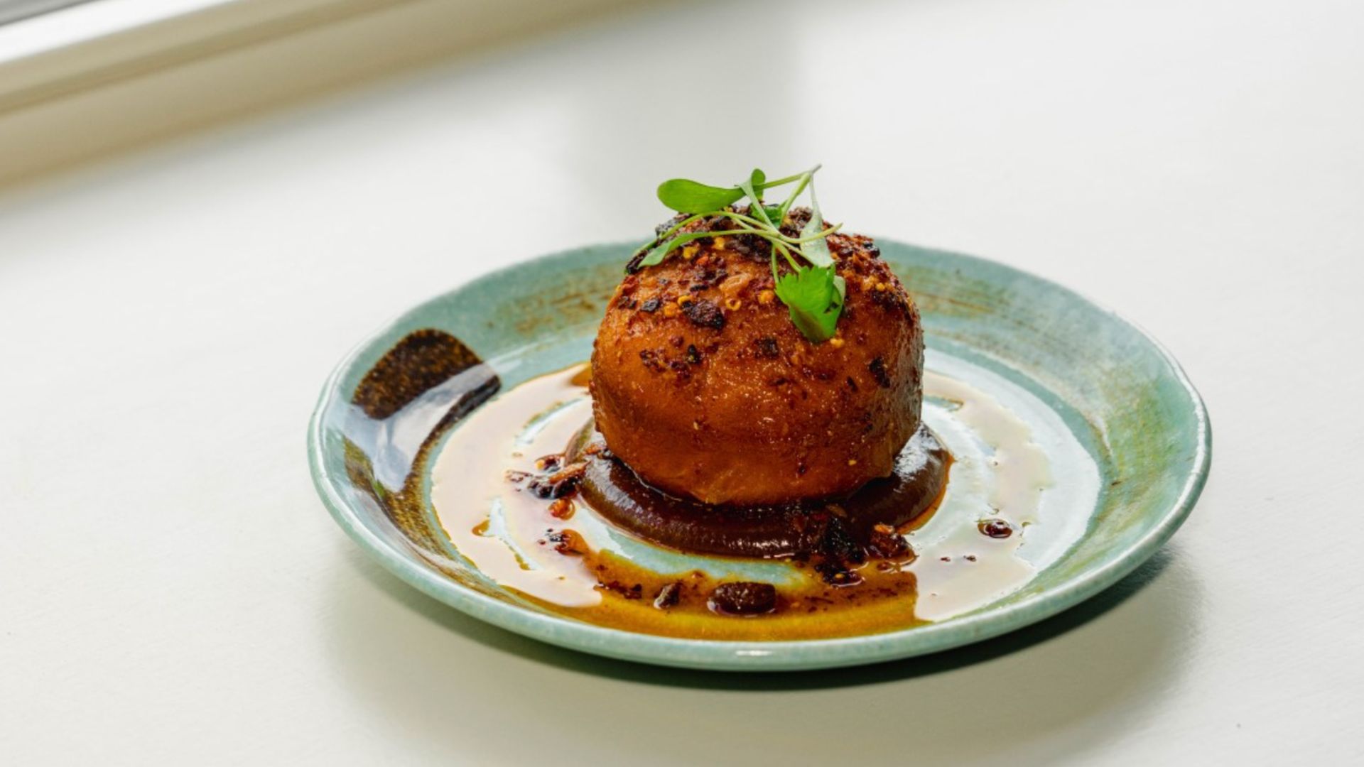 an image of an arancini starter dish from Michelin