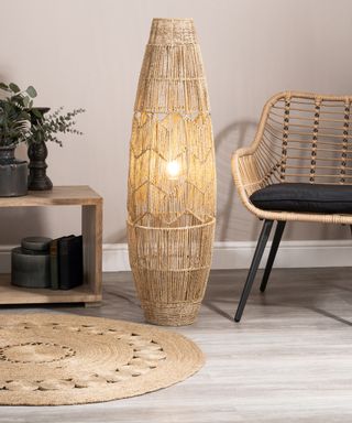 Rattan floor lamp with jute rug and bamboo chair from BHS