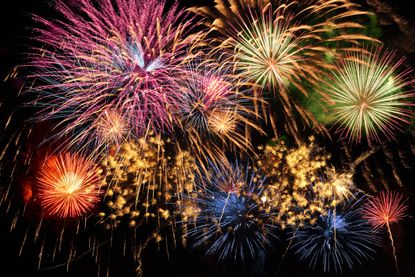 Fireworks against night sky.