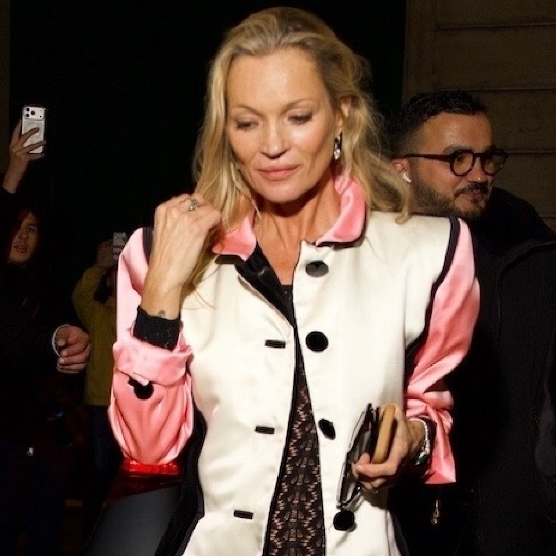 Kate Moss attended a Saint Laurent Paris Fashion Week after party in a sheer crocheted jumpsuit and a vintage YSL jacket