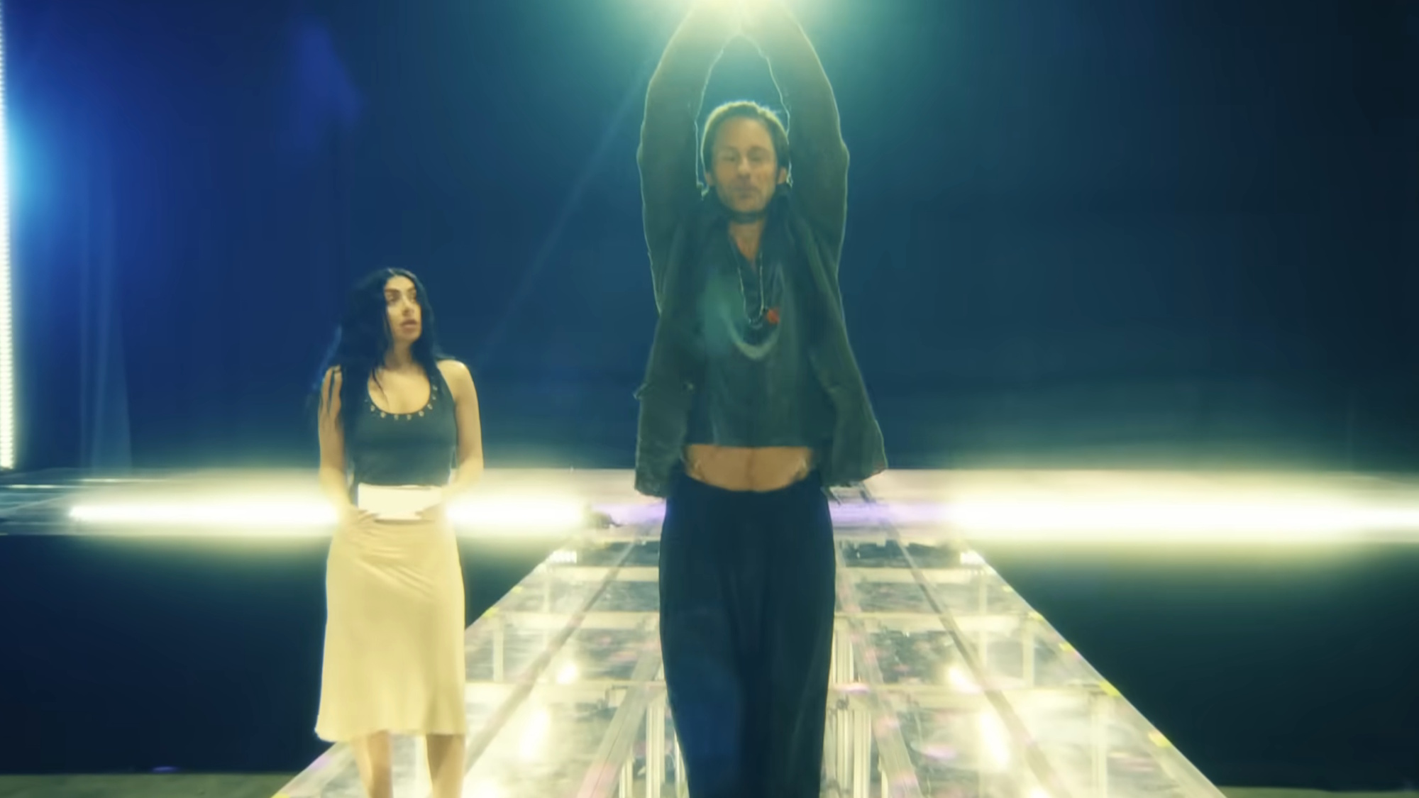Charli XCX is shown in The Moment.