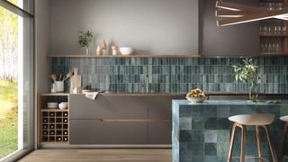 Kitchen with blue splashback and island tiles