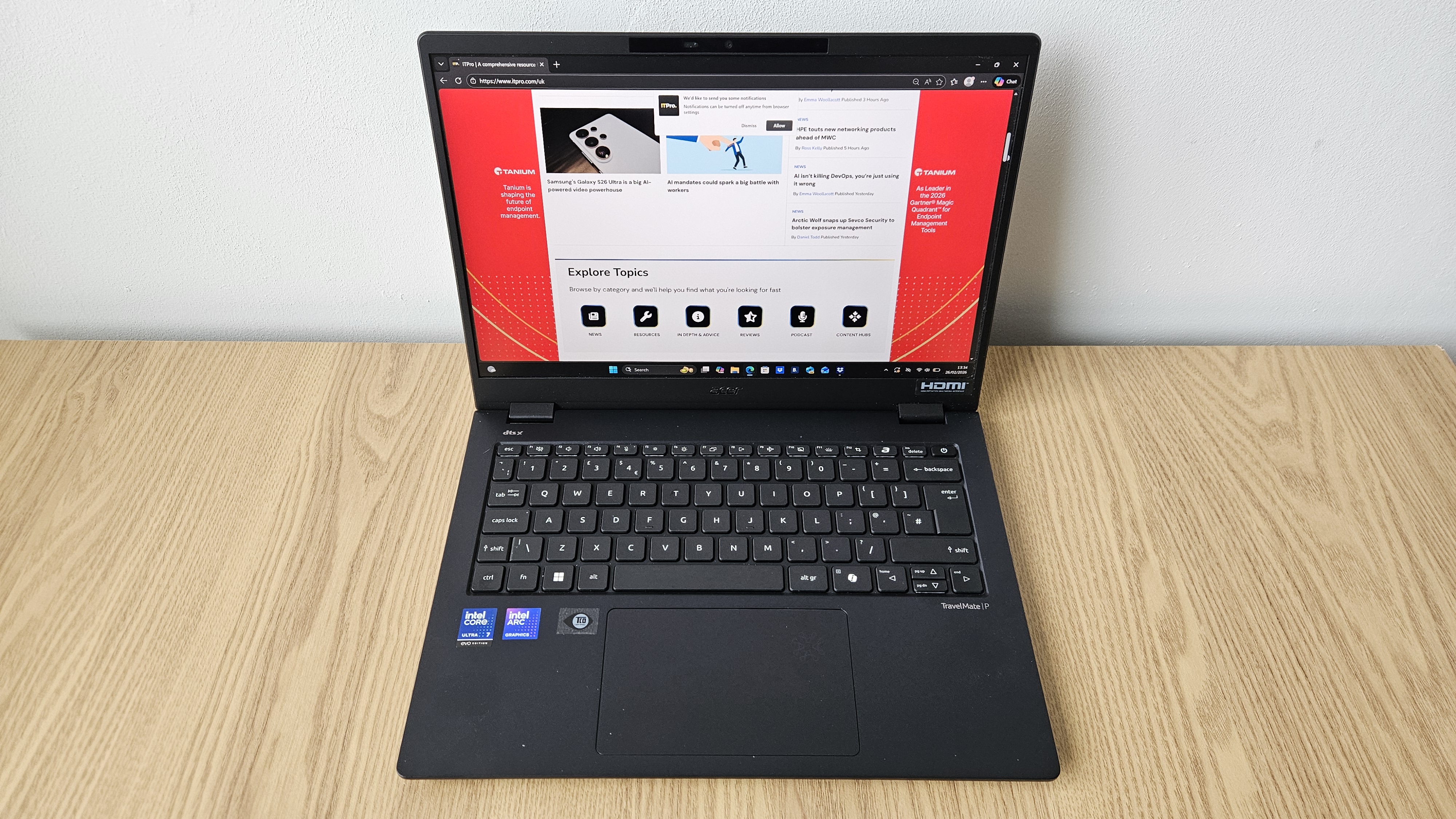 The Acer TravelMate P6 14 AI on a desk